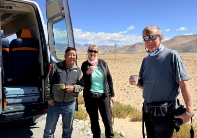 Traveler photo: A quick break on the road: parking, sipping hot tea, gazing at snow peaks, and planning the way ahead. (June 2026)