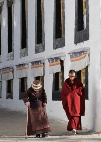 Traveler photo: In a temple corner, two Tibetans walk side by side, enjoying a moment of peace.  (June 2026)