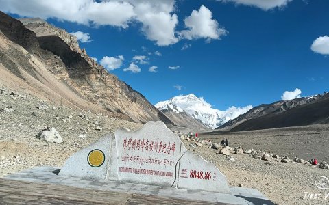Traveler photo: From the elevation marker, gazing at Everest's grandeur against the azure sky. (Jun 2025)