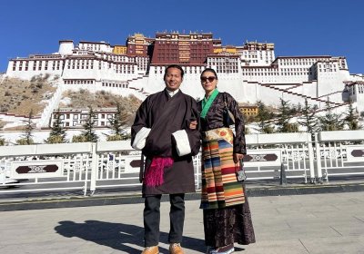 Traveler photo: With the Potala Palace as our backdrop and Tibetan robes as our dress, this moment is truly Tibetan. (Jun 2025)