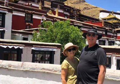 Traveler photo: Amidst red walls and golden roofs, documenting our connection with Tashilhunpo Temple. (Jun 2025)