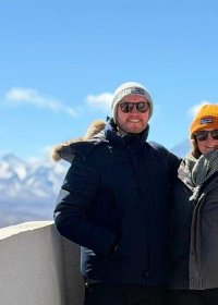 Traveler photo: Witnessed by the mountain range, this photo of three guests becomes the journey's most treasured keepsake. (March 2026)