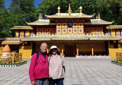 Traveler photo: Guests happily pose before Norbulingka's elegant buildings, capturing their unforgettable Lhasa memory. (May 2026)