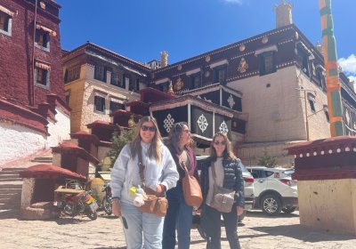 Traveler photo: Guests look up at Potala Palace's towering walls, this candid shot full of quiet focus. (May 2026)