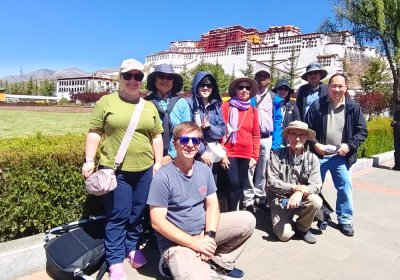 Traveler photo: With the Potala Palace as backdrop, the guests freeze an unforgettable moment at the snowy sanctuary. (May 2026)