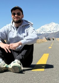 Traveler photo: The road stretches ahead as guests sit safely, freezing smiles together with the snow mountains in one frame. (May 2026)