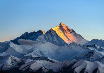 Traveler photo:Sunset casts a golden glow over the summit of Mount Everest in May. (May 2026)	