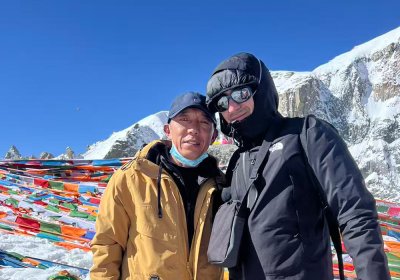 Traveler photo: Our beloved guest take pictures with our local Tibetan guide during the three days Kora around Mount Kailash. (May 2026)	