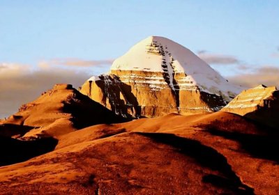 Traveler photo: Mt. Kailash glowing golden under the May sunset. (May 2025)