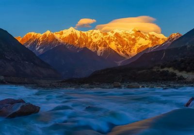 Traveler photo: Mount Namcha Barwa in Nyingchi turns golden under the sunset—a silent, breathtaking spectacle. (May 2026)