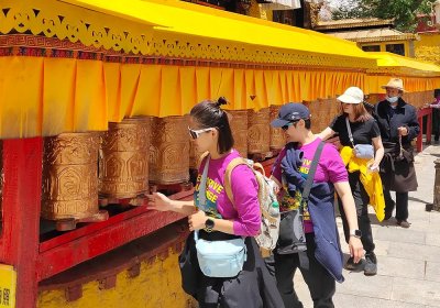 Traveler photo: Classic Tibetan temple architecture with golden roofs and colorful window frames. (May 2025)