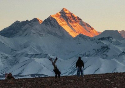 Traveler photo: Sunset casts a golden glow over the summit of Mount Everest. (November 2025)