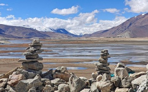 Traveler photo: The Mani stones are offerings made by Tibetan Buddhists to accumulate merit and express goodwill.. (November 2025)