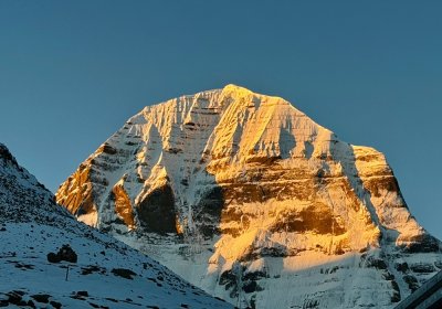 Traveler photo: Sunset casts a golden glow over the summit of Mount Kailash. (October 2026)