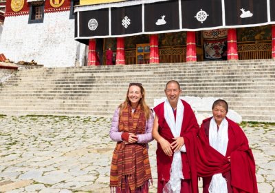 Traveler photo: Our traveler takes a picture with Tibetan monks at Sera Monastery. (October 2026)