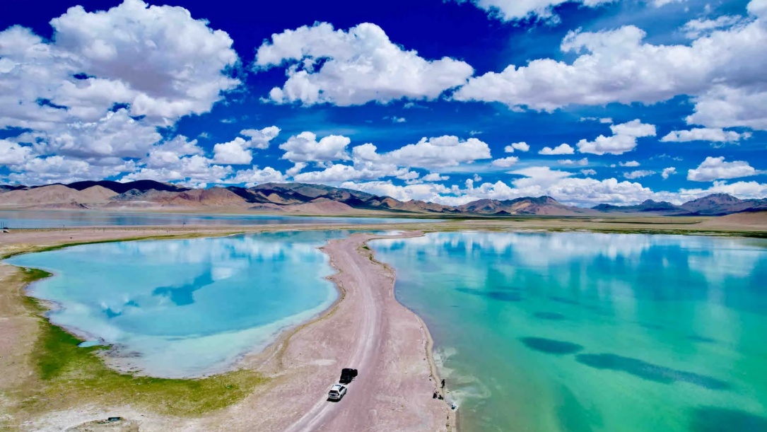 Beautiful Zhari Namco under fluffy clouds