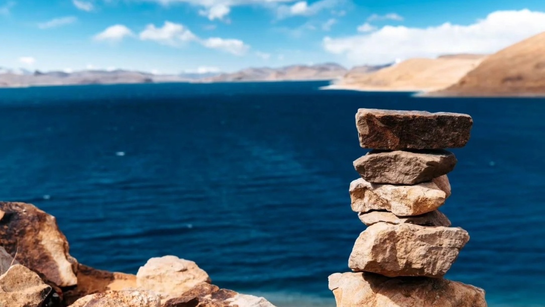 Mani stone by Yamdrok Lake