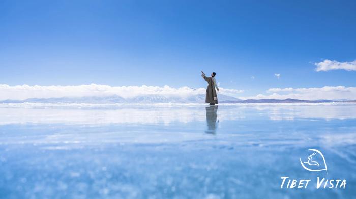 Lower your camera to use symmetry to frame your photos