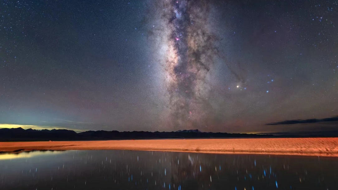 Milky Way galaxy over horizon at sunset