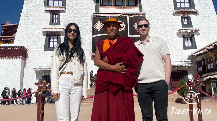 guests took photos with monks seen at the Potala Palace