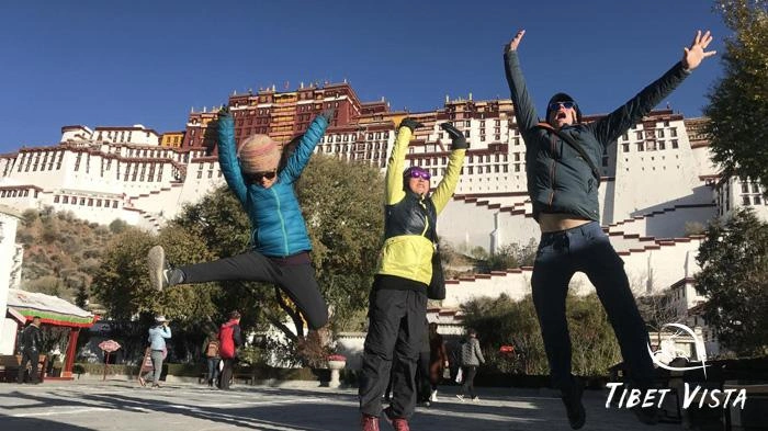 Tourists take fun shots at the Potala Palace