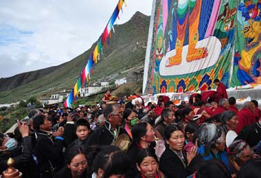 Hundreds of Tibetan pilgrims and lamas attending the  Buddha Exhibition Festival in Tashilumpo Monastery.