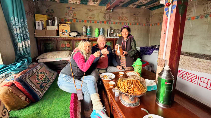 enjoy a traditional Tibetan meal at a local family restaurant