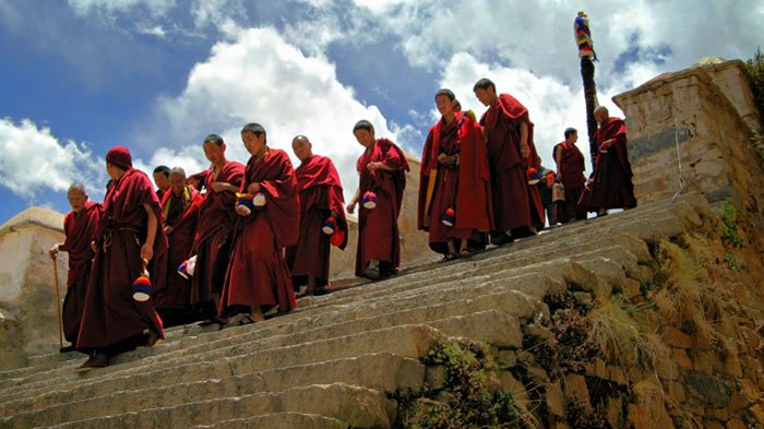 tibetan monks after morning chanting 