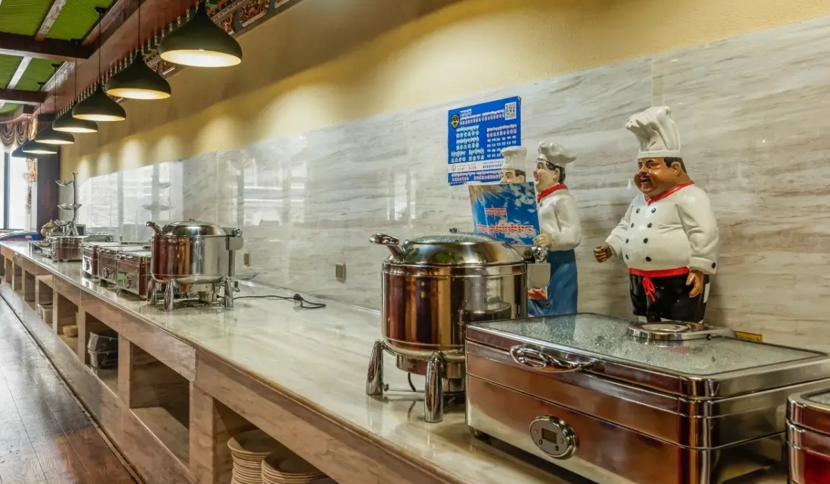 Hotel buffet counter with breakfast food warmers