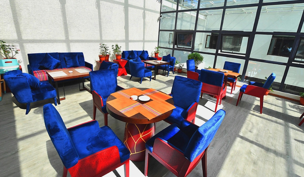 Sunlit indoor dining room at Lhasa Thangka Hotel