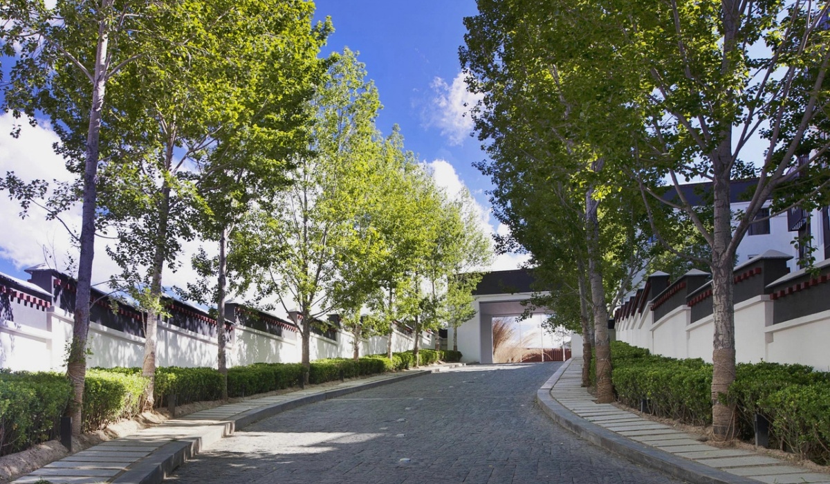 Beautiful driveway and garden entrance of St. Regis Lhasa Resort