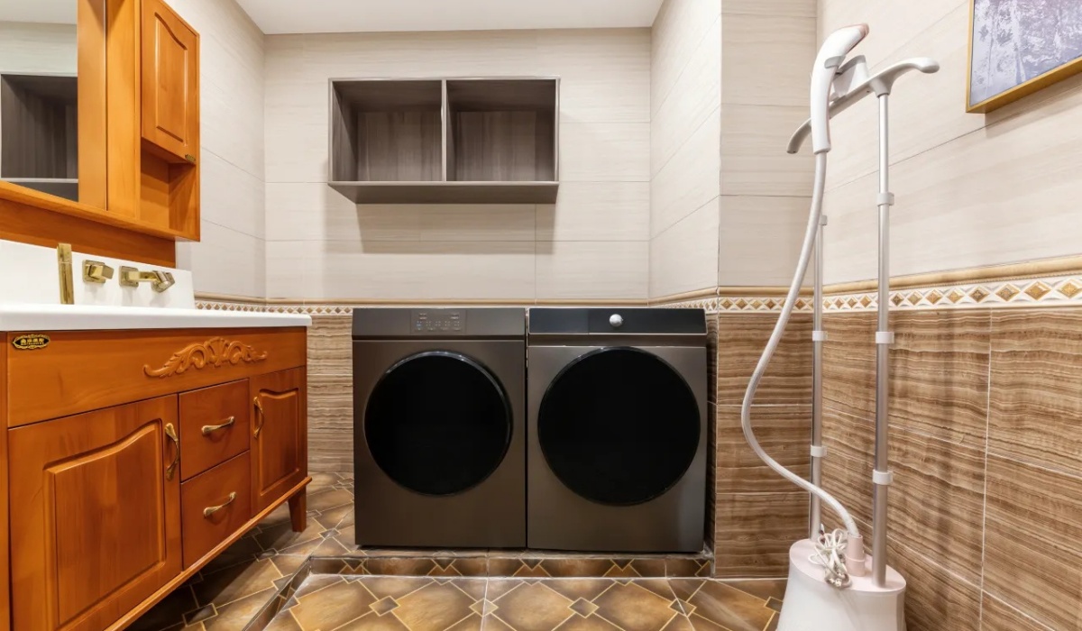 Self-service guest laundry room with washing machines
