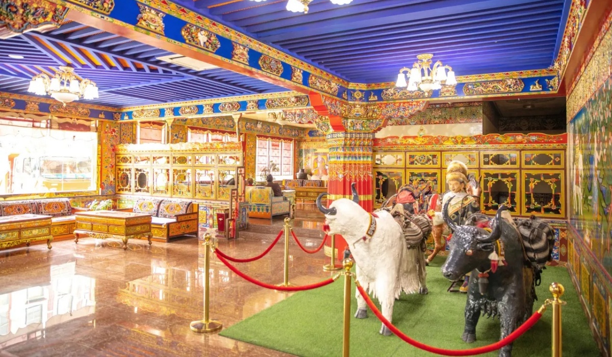 Tibetan culture exhibit with yak statues in Gesar Hotel lobby