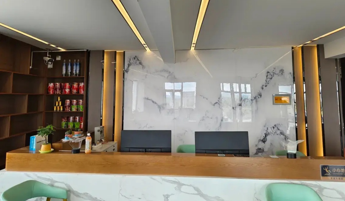 Modern front desk reception counter at Letu Hotel Darchen