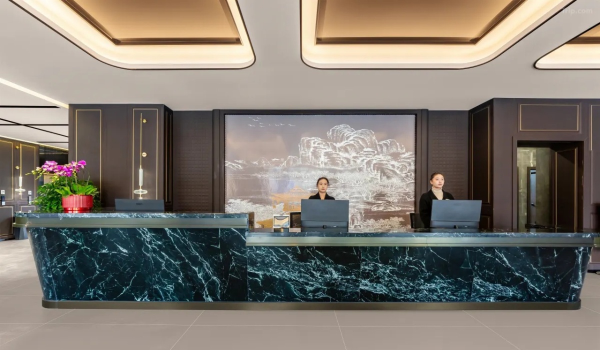 24-hour reception front desk at Sheli Hotel Shigatse