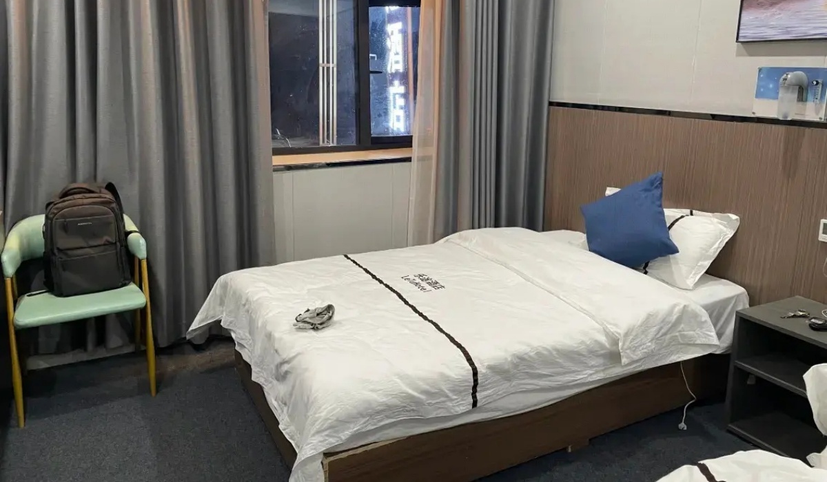 Cozy guest bedroom interior with wall-mounted oxygen outlet at Letu Hotel