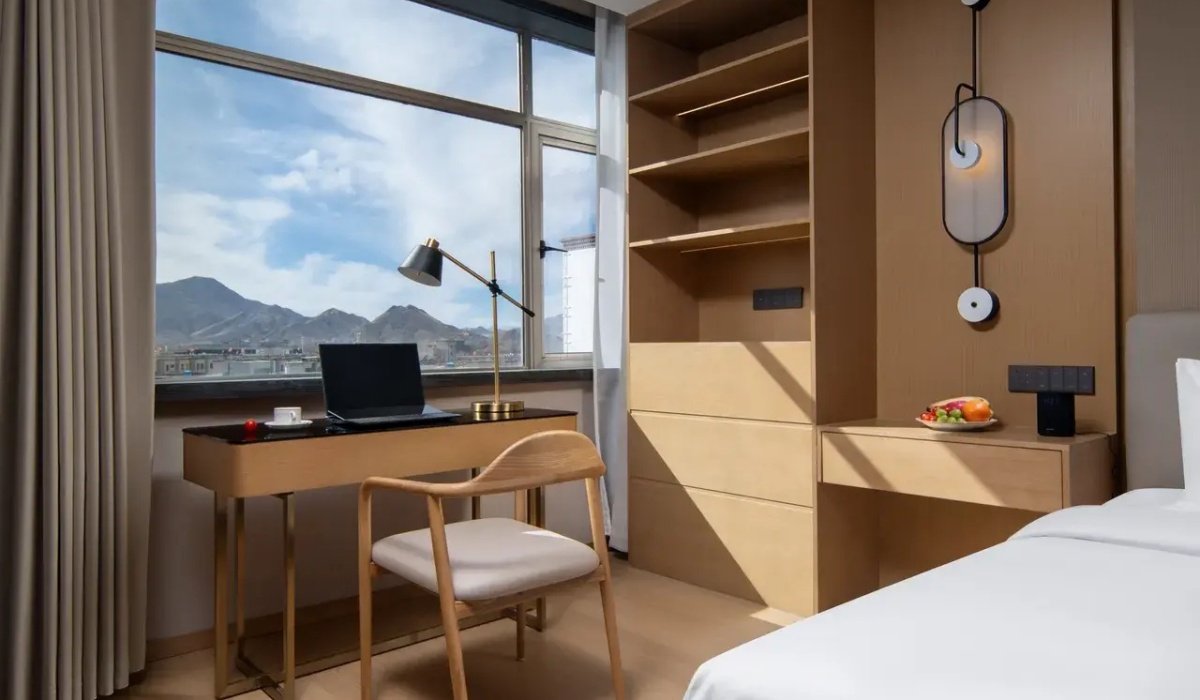Guest room window view of surrounding plateau mountains