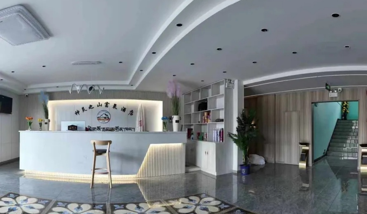 Wide angle view of hotel lobby and reception at Shenling Mountain Hotel