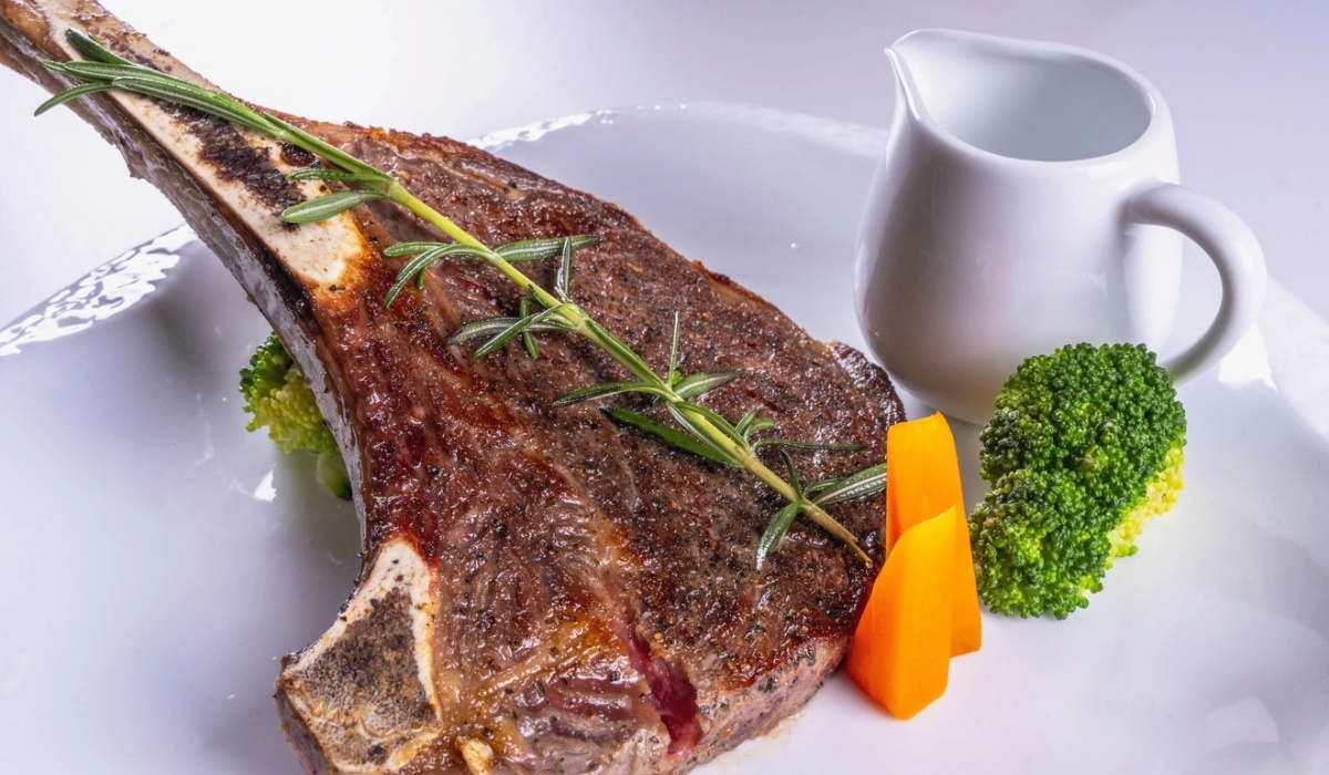 Grilled tomahawk steak with rosemary