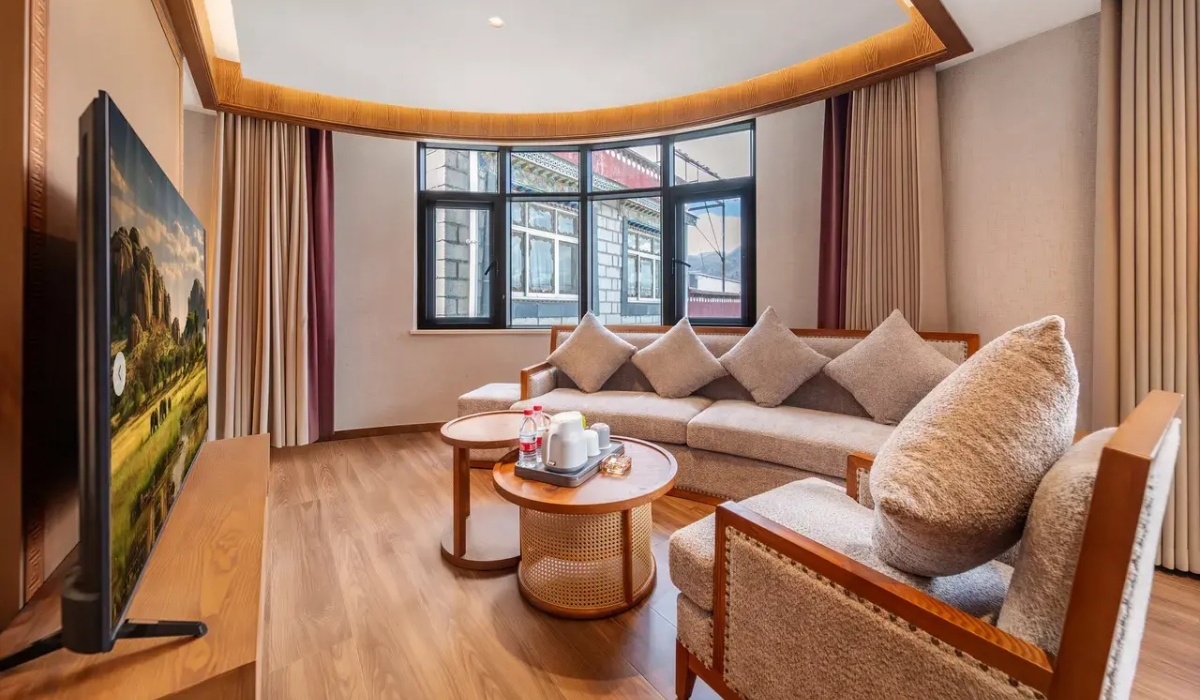 Suite living room at Lhasa Yak Hotel with comfortable seating
