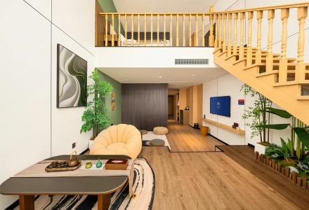 Duplex loft suite living area with tea table and sofa at QoMoLangZong Hotel Kayrung