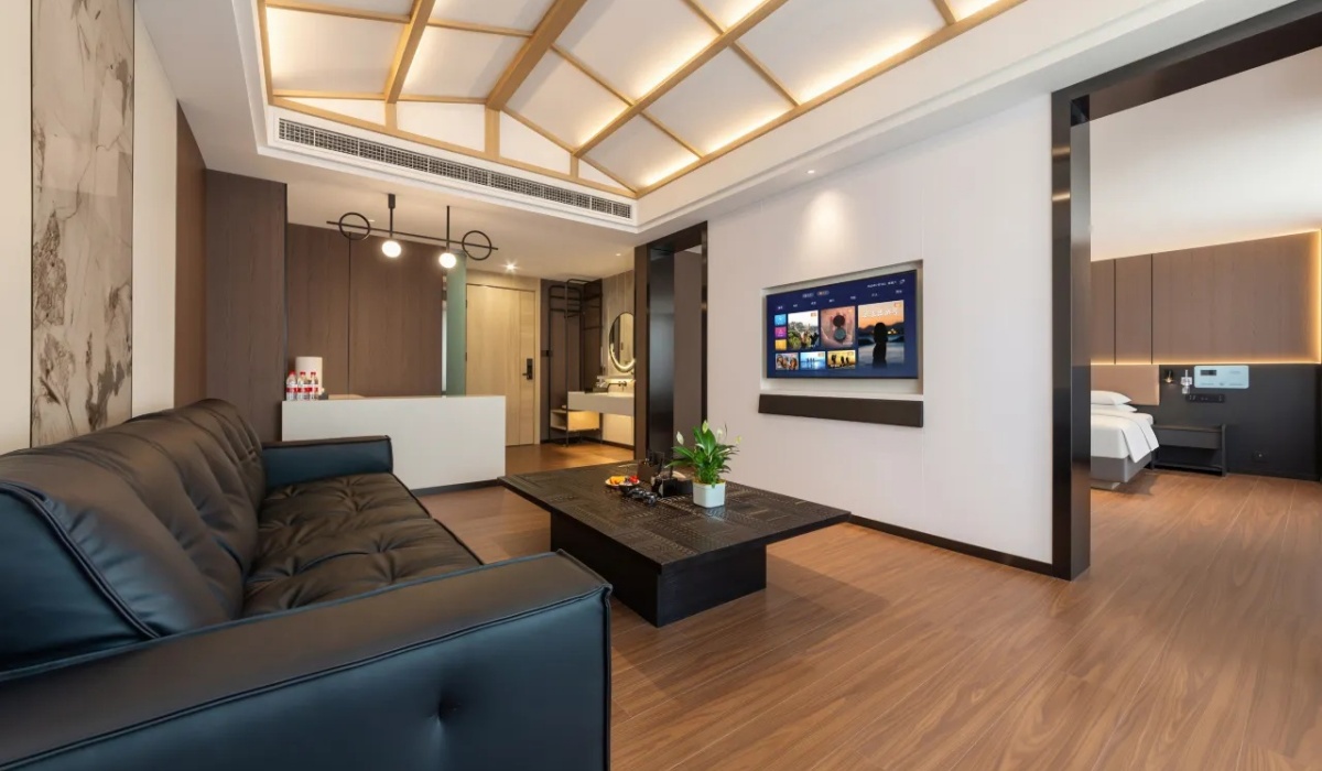 Spacious executive suite living room with sofa