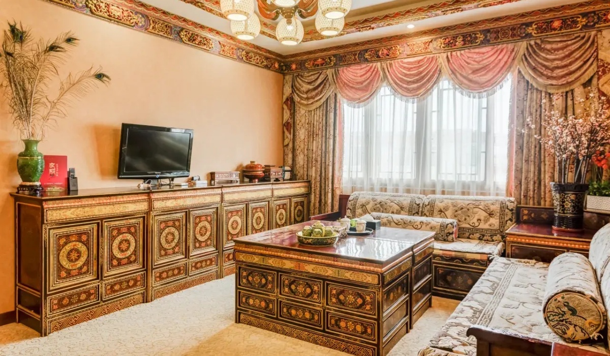 Cozy suite living room with Tibetan wooden furniture