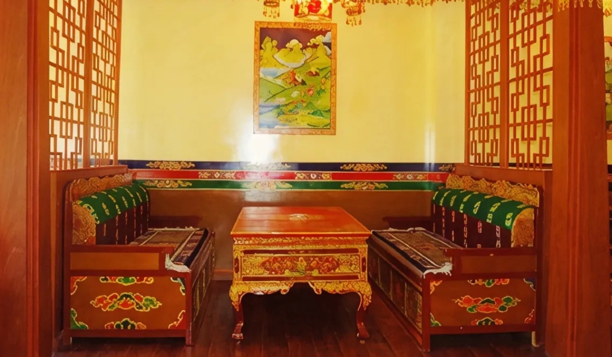 Traditional Tibetan dining booth with carved wooden table