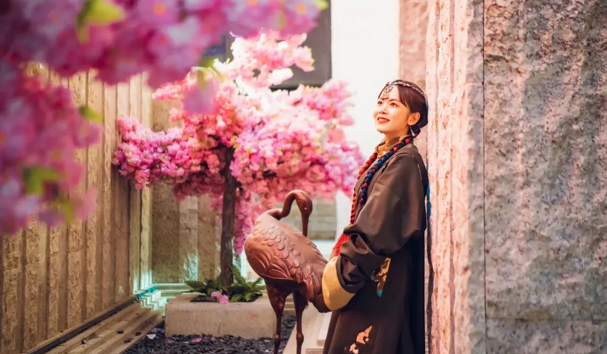 Tibetan dress guest in hotel garden