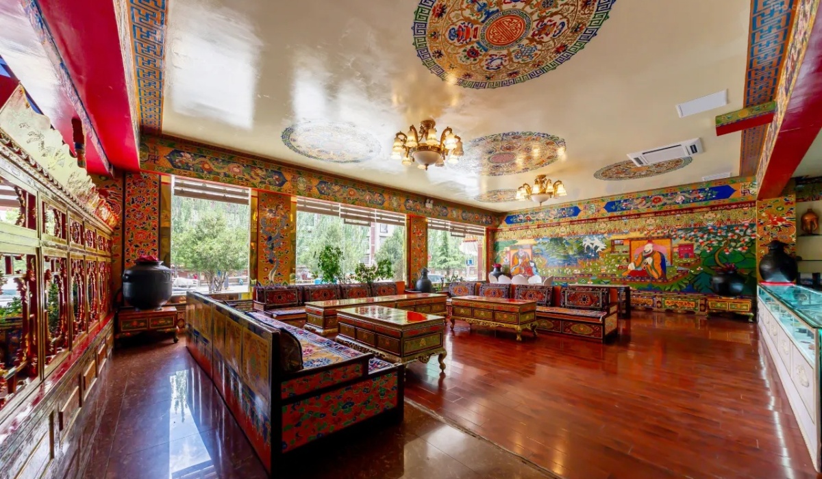 Traditional Tibetan tea house with painted murals and wooden tables