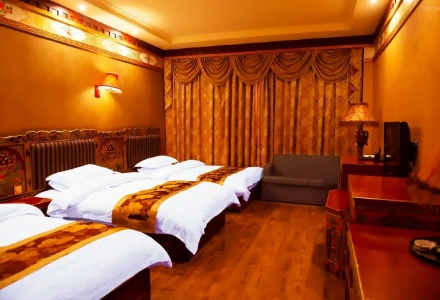 Triple bed room setup at Shiga Yangcha Grand Hotel