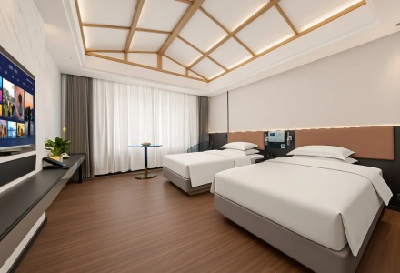 Twin beds guest room with wood ceiling