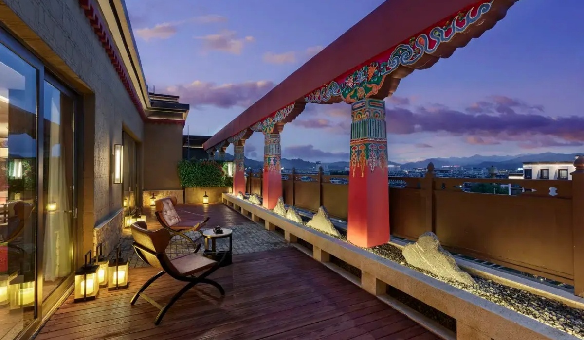 Outdoor terrace with Tibetan pillars at twilight