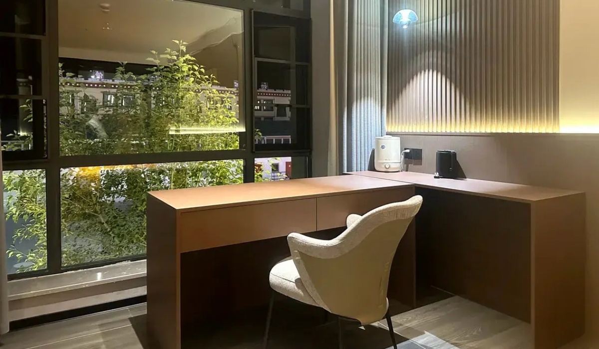 Work desk by the window at Western Inn Sheli Hotel